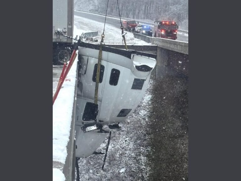 Icy Roads Cause 18-Wheeler to Dangle Off 100-Foot Bridge in West Virginia; Driver Rescued After Hours-Long Operation