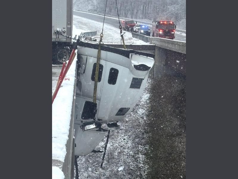 Icy Roads Cause 18-Wheeler to Dangle Off 100-Foot Bridge in West Virginia; Driver Rescued After Hours-Long Operation